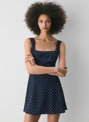 Fit-and-flare micro dress with polka dot pattern